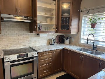 Organized kitchen cabinets with categorized dishware