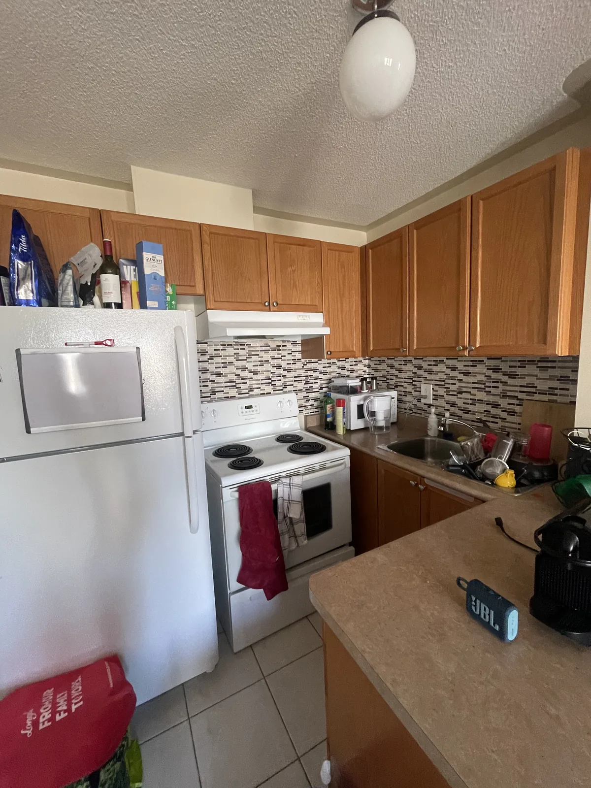 Kitchen before professional home organizing in the GTA - Chaos Meets Order